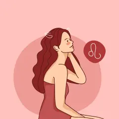 Kobieta lew z burzą rudych włosów i symbolem zodiaku.