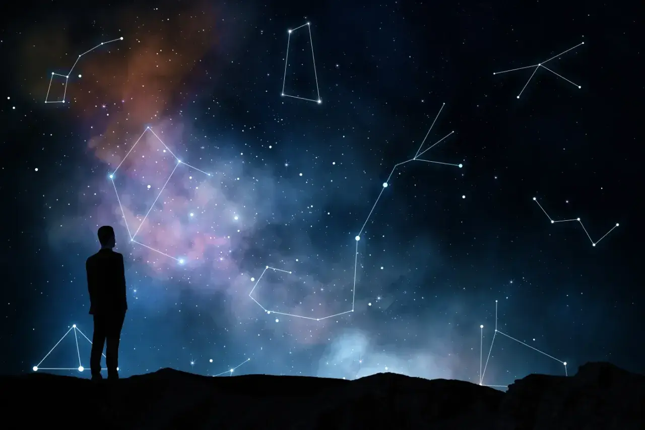 Człowiek wpatruje się w nocne niebo pełne gwiazd i konstelacji, szukając odpowiedzi, czy wśród nich kryje się najgorszy znak zodiaku.