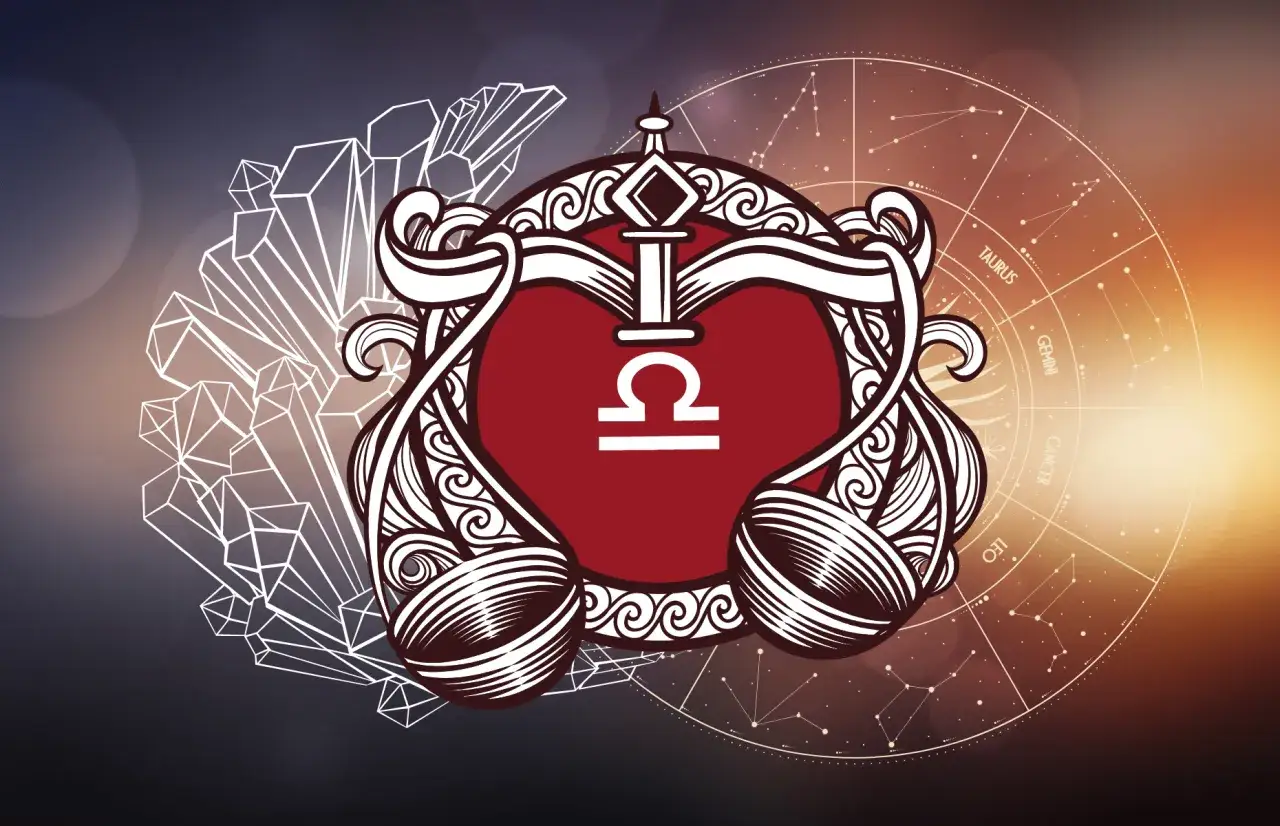 Symbol Wagi w ozdobnej ramie, otoczony kryształami i kołem zodiaku. Ascendent w wadze symbolizuje równowagę.