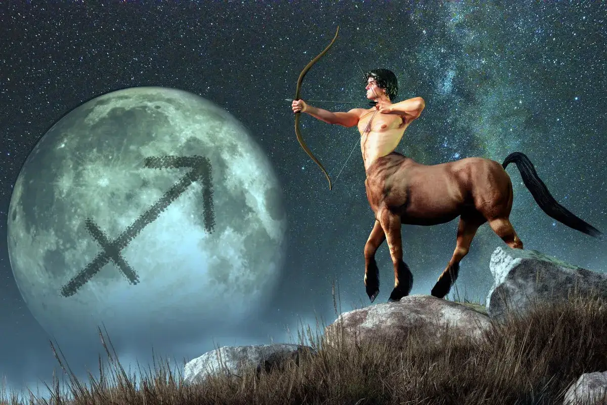 Centaur z łukiem celuje w księżyc z symbolem Strzelca. Jego ascendent w strzelcu jest gotowy do lotu.